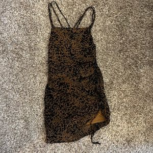Animal print mini dress, size L, adjustable sinch length, great condition